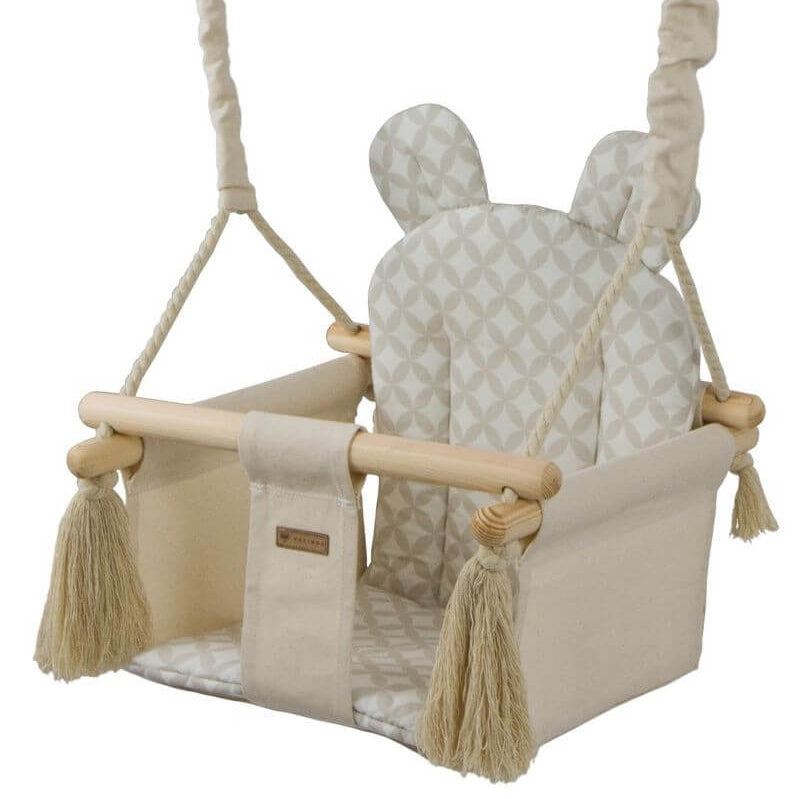 Baby gynge med ører. Vores gynger til børn kommer i flere farver, her med et flot diamantmønster i beige
